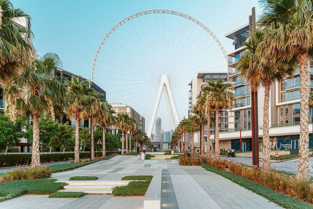 Landscaped walkways between the residences lead straight to Ain Dubai.